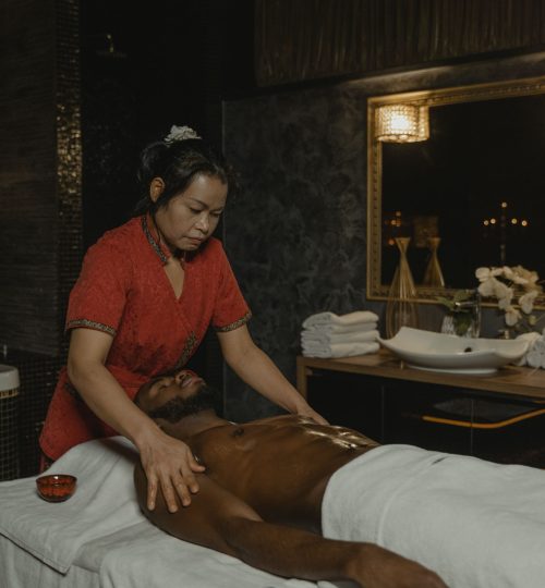 Serene spa treatment with a skilled masseuse providing relaxation and relief.